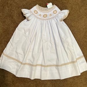 Adorable Shrimp and Grit kids smocked seashell dress, white and tan. 12 month
